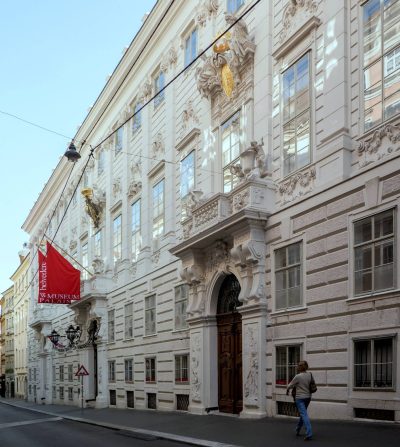 Street view of the richly decorated Baroque façade of Prince Eugene’s Winter Palace on Himmelpfortgasse in central Vienna, with carved stone ornament, tall windows and an elaborate entrance portal.