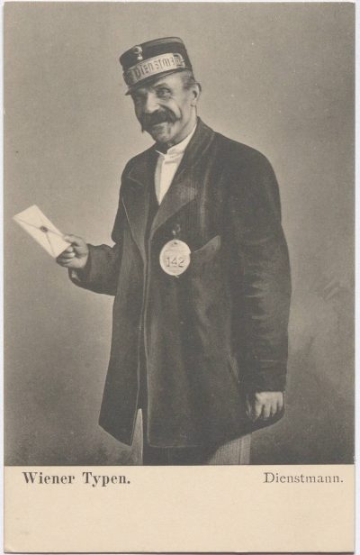 Historical postcard portrait of a moustached Viennese Dienstmann in a dark uniform and numbered cap, holding a sealed envelope in one hand and wearing an identification badge marked 142.